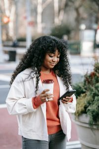 Businessperson receiving transactional SMS notification in real time. 